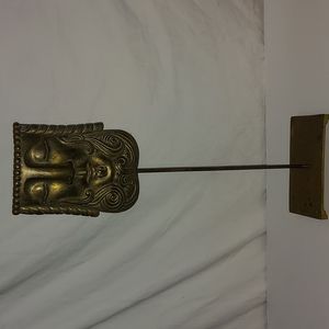 Brass. MCM. Face.  Patina and aged. Approx 19 inches. Tall.